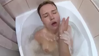 RUSSIAN CHICK TAKES a BATH WITH a PLUG IN THE REAR-END